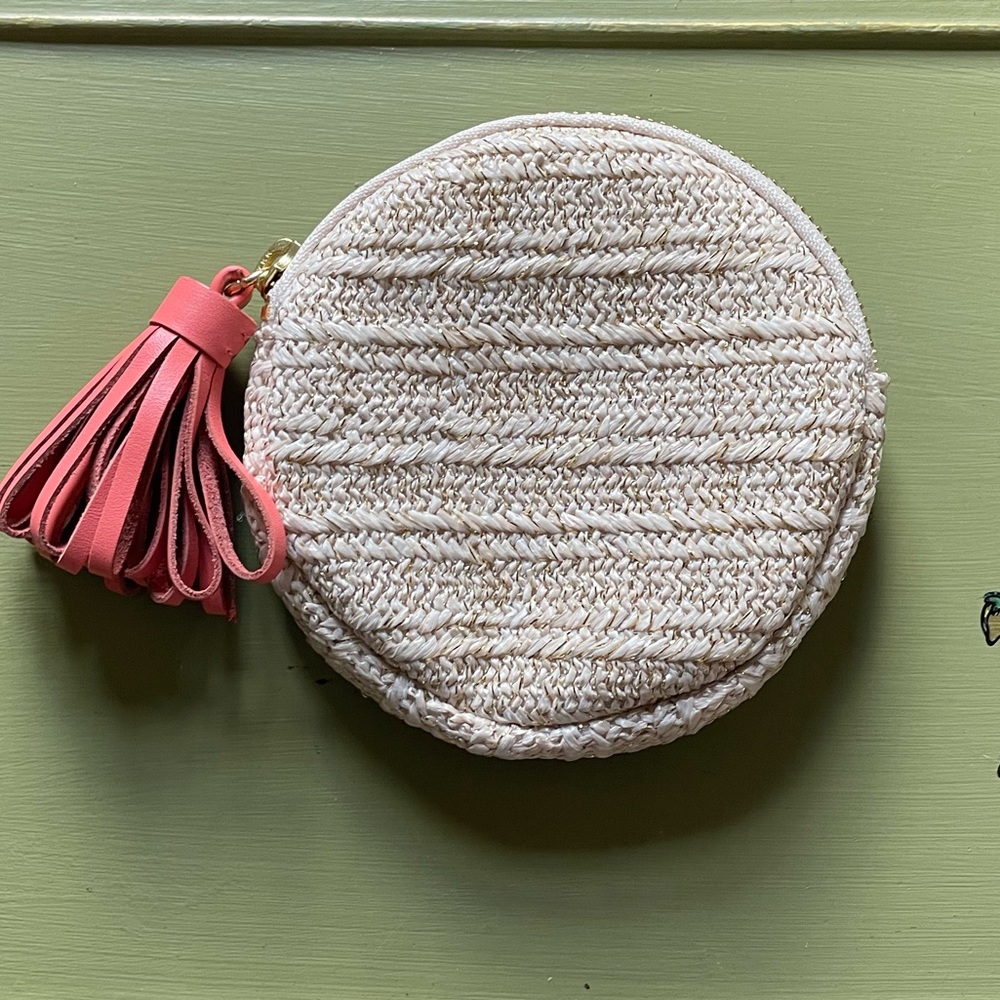 Anthropologie round wallet with leather tassel